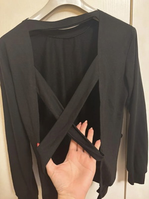 Black sweatshirt-style blouse with open back, like new, size large