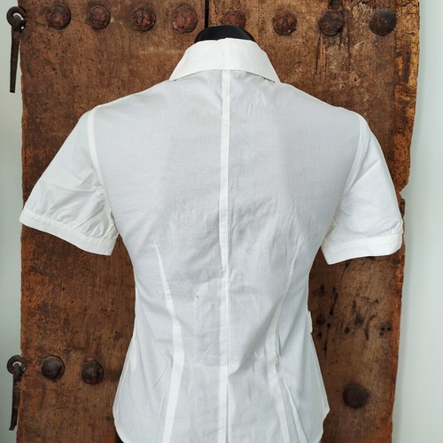 White short sleeve utility shirt with contrast stitching and waist strap