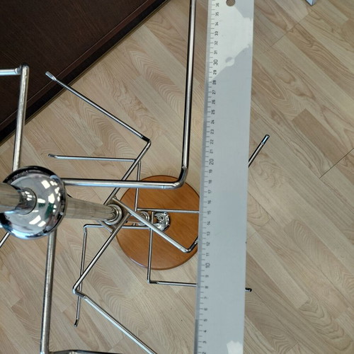 Metal three-tier countertop stand used with wooden base
