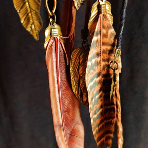 Vintage Accessorize long necklace with feathers and embossed leaves like new