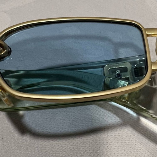 Men's sunglasses used with gold rectangular frame and blue lens