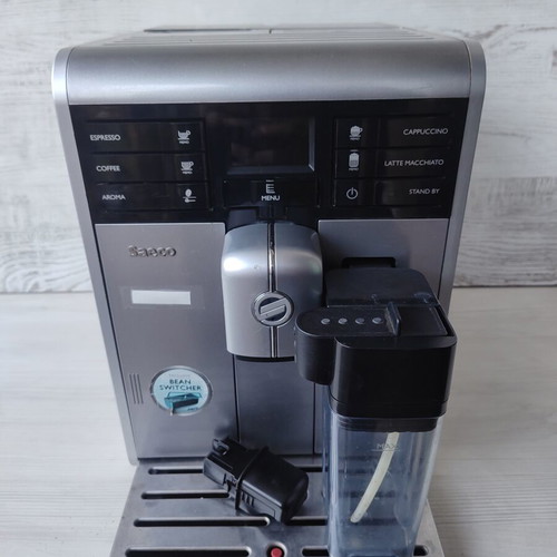 Saeco Moltio One Touch Cappuccino espresso machine with milk carafe and bean switcher