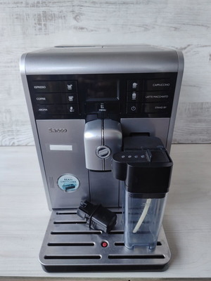 Saeco Moltio One Touch Cappuccino espresso machine with milk carafe and bean switcher