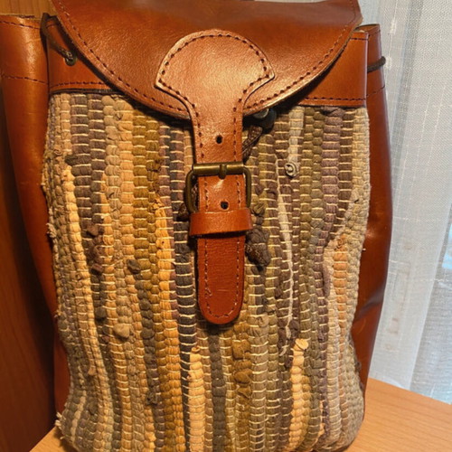 Vintage backpack with leather and woven multicolor design like new