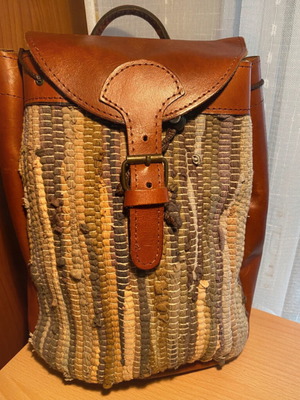 Vintage backpack with leather and woven multicolor design like new