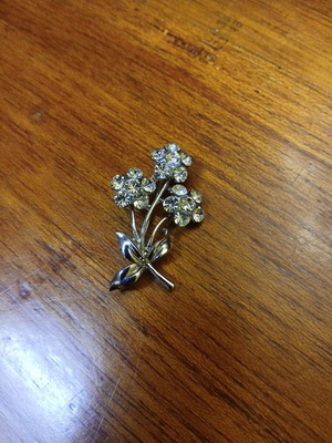 Flower brooch with rhinestones silver used