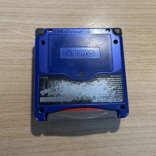Game Boy Advance SP cobalt blue used with charger and NES Classics cartridge