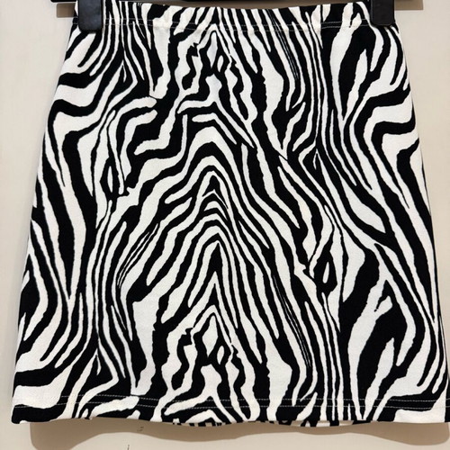 Mini skirt with animal print and front slit by Shein, like new