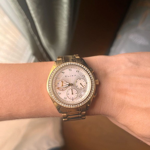 Elixa women's watch like new, gold bracelet with crystals