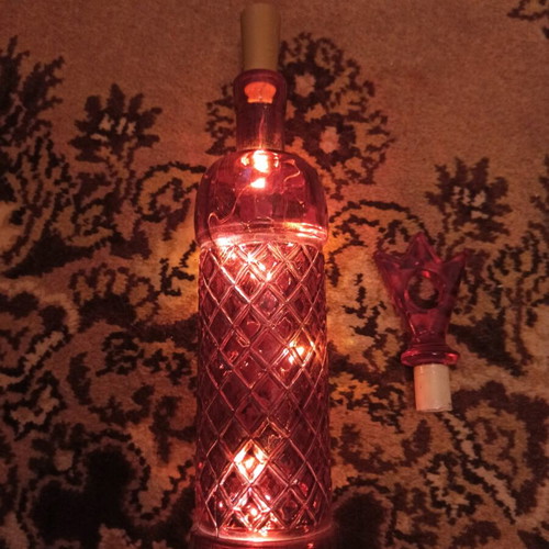 Bottle with LED light like new, blue and red