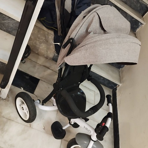 Lorrelli Neon tricycle used with rotating seat and canopy