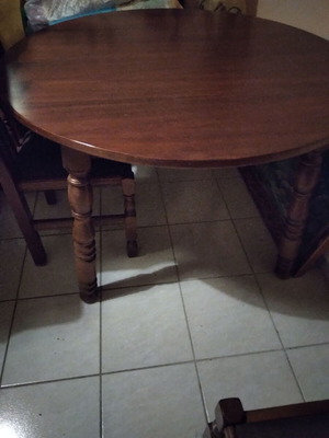 Dining table with four carved chairs like new