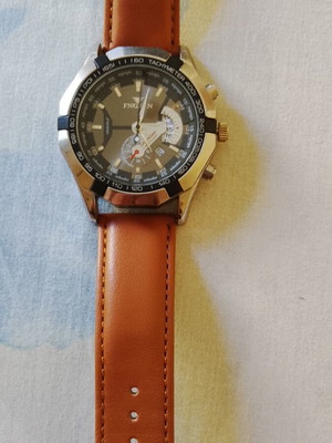 Waterproof wristwatch new with date display, black and brown