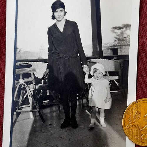 Vintage photo woman with child in cafe 1930s like new