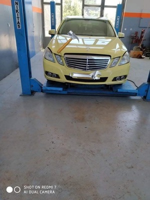 Four-post lift used machine
