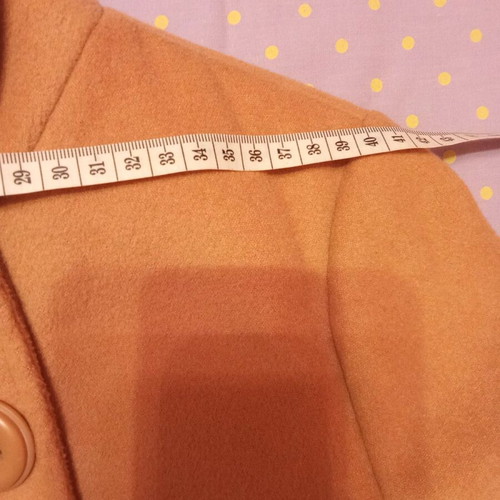 Beige coat with burgundy size medium like new