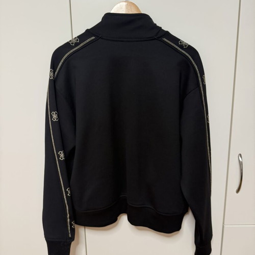 Guess women's black zip-up sweatshirt size L like new
