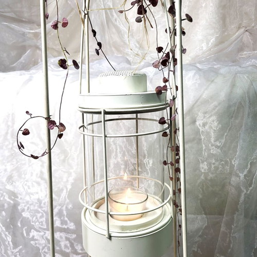 Floor metal lantern with iron base like new, vintage/industrial style