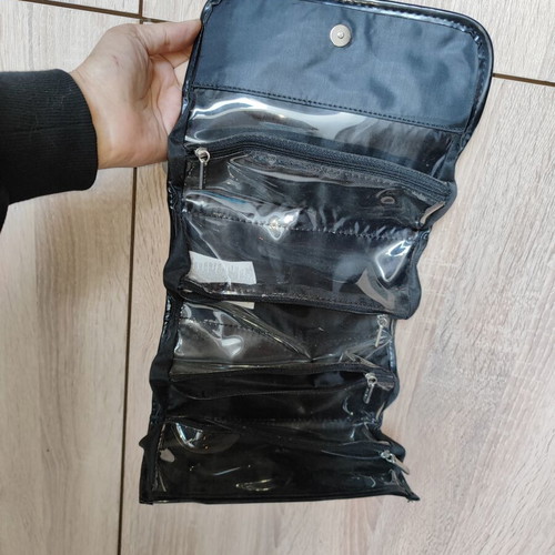 Avon foldable toiletry bag with 4 transparent zippered compartments like new, black