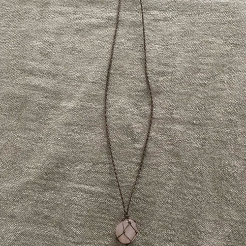 Boho long pendant like new with cord and pink stone