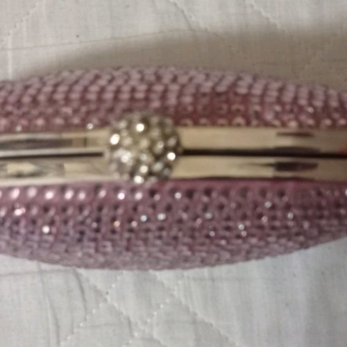 Accessorize pink clutch bag