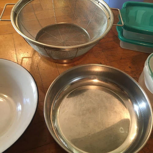 Kitchen items used, tupperware, strainer, basin