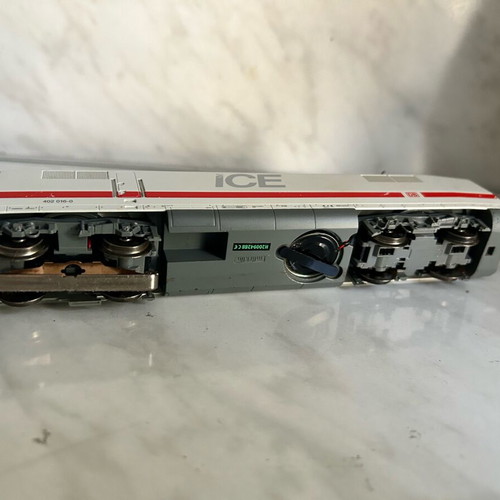 Marklin digital ICE HO train engine and one car used, for repair or parts