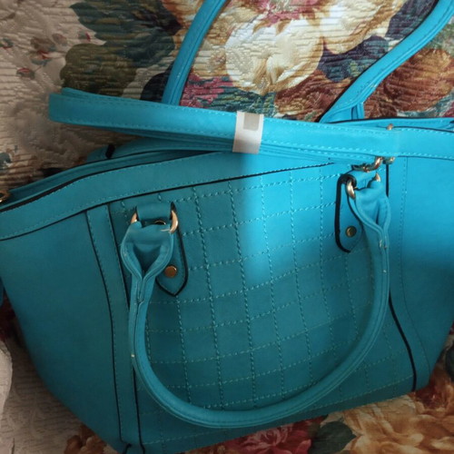 Bag with long strap with small signs of wear