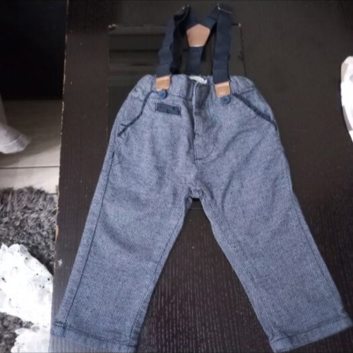 Fabric pants with suspenders for 9-month-old boy like new