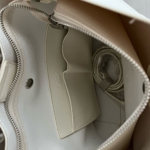 Axel shoulder bag white like new with unused strap