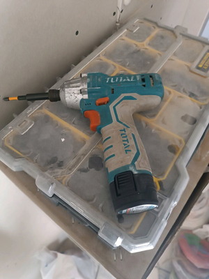 Total 12V pulse drill used with 2 batteries in good condition