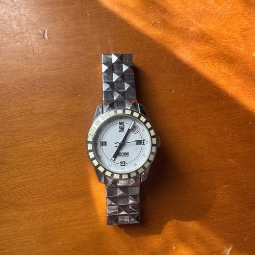 Moschino wristwatch used with wear on bracelet