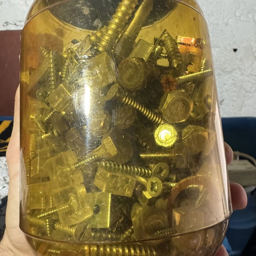 Plastic container with various screws