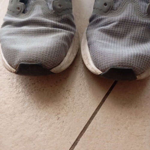 Nike men's athletic shoes, grey, size 43, missing laces