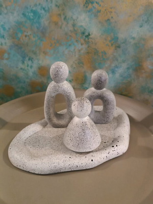 Plate with three white figures with black speckles like new