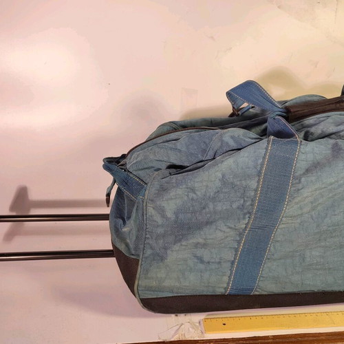 Large Enrico Benetti suitcase used with wheels and hard base blue