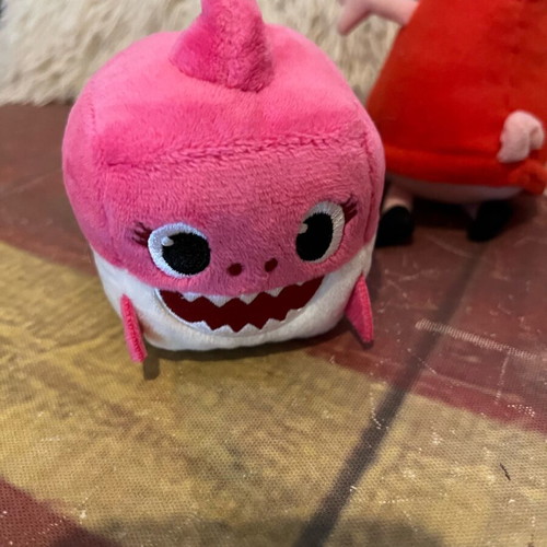 Peppa Pig and Baby Shark plush toys used without sound