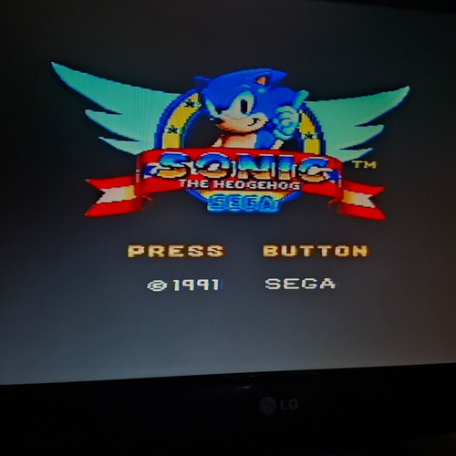 Sega Master System II used with 2 cartridges and new power supply