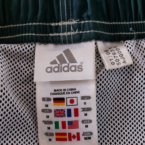 Adidas men's swim shorts used, green, size M, stain on front