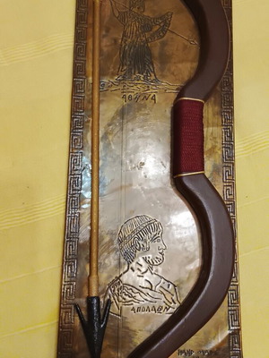 Greek traditional copper wall decor with Athena and Apollo used