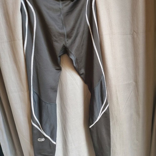 Leggings used black with gray details and ankle zippers