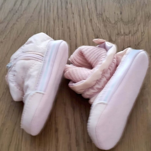 Pink baby booties with fleece lining