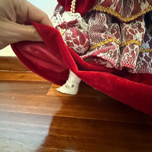 Porcelain doll with burgundy velvet dress like new