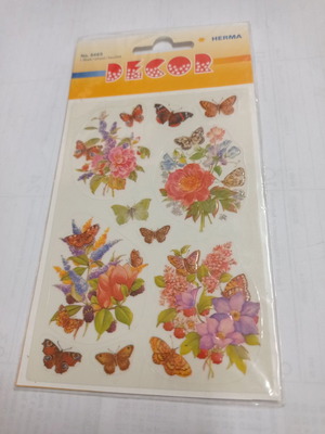 Stickers with embossed flowers used, 2 cm