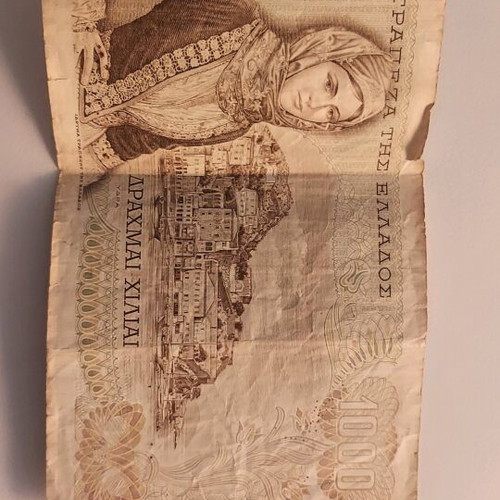 Greek and American paper money used