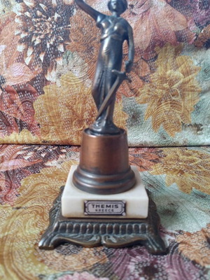 Bronze statue of goddess Themis refurbished, marble base