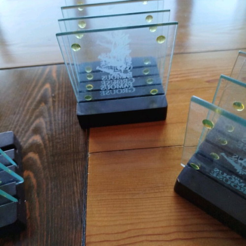 Famous Grouse glass coasters set like new, 11 pieces
