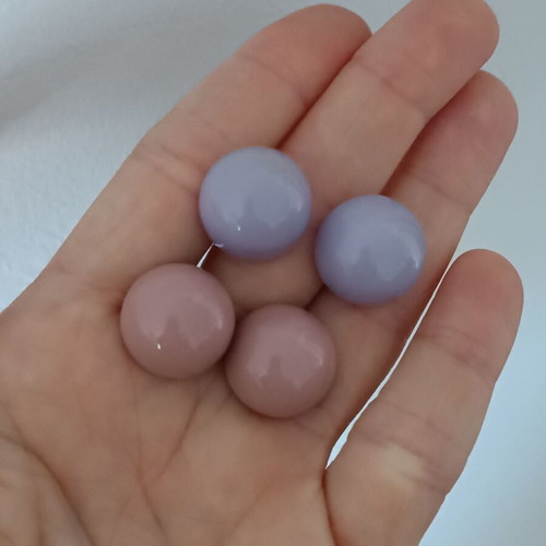 Plastic stud earrings set in lilac and dusty apple colors like new