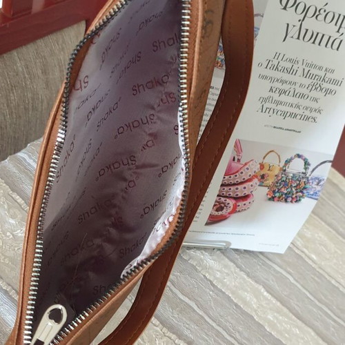 Brown shoulder bag with unique pattern like new