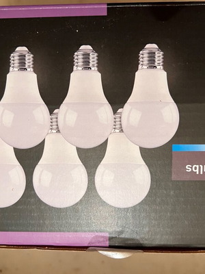 Set of six new light bulbs in box